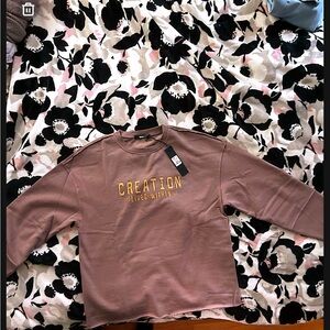 Brown Sweatshirt with Yellow Text